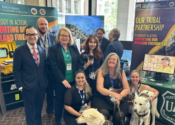 Excel staff members at Forest Service conference