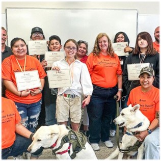 STEM students displaying their completion certificates